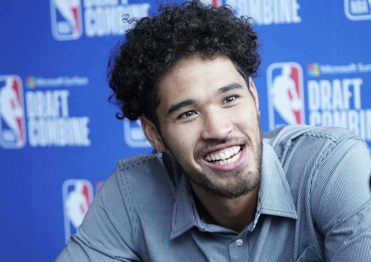 Johnny Juzang talks to the media during the 2022 NBA Draft Combine at Wintrust Arena.